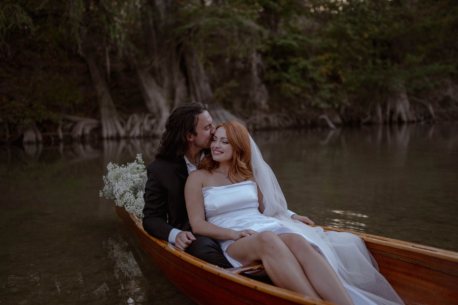 Texas hill country elopement couple in canoe.