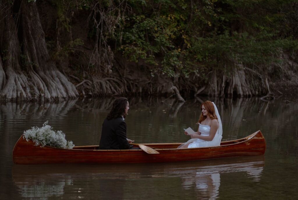 texas hill country elopement couple reading their vows to each other.